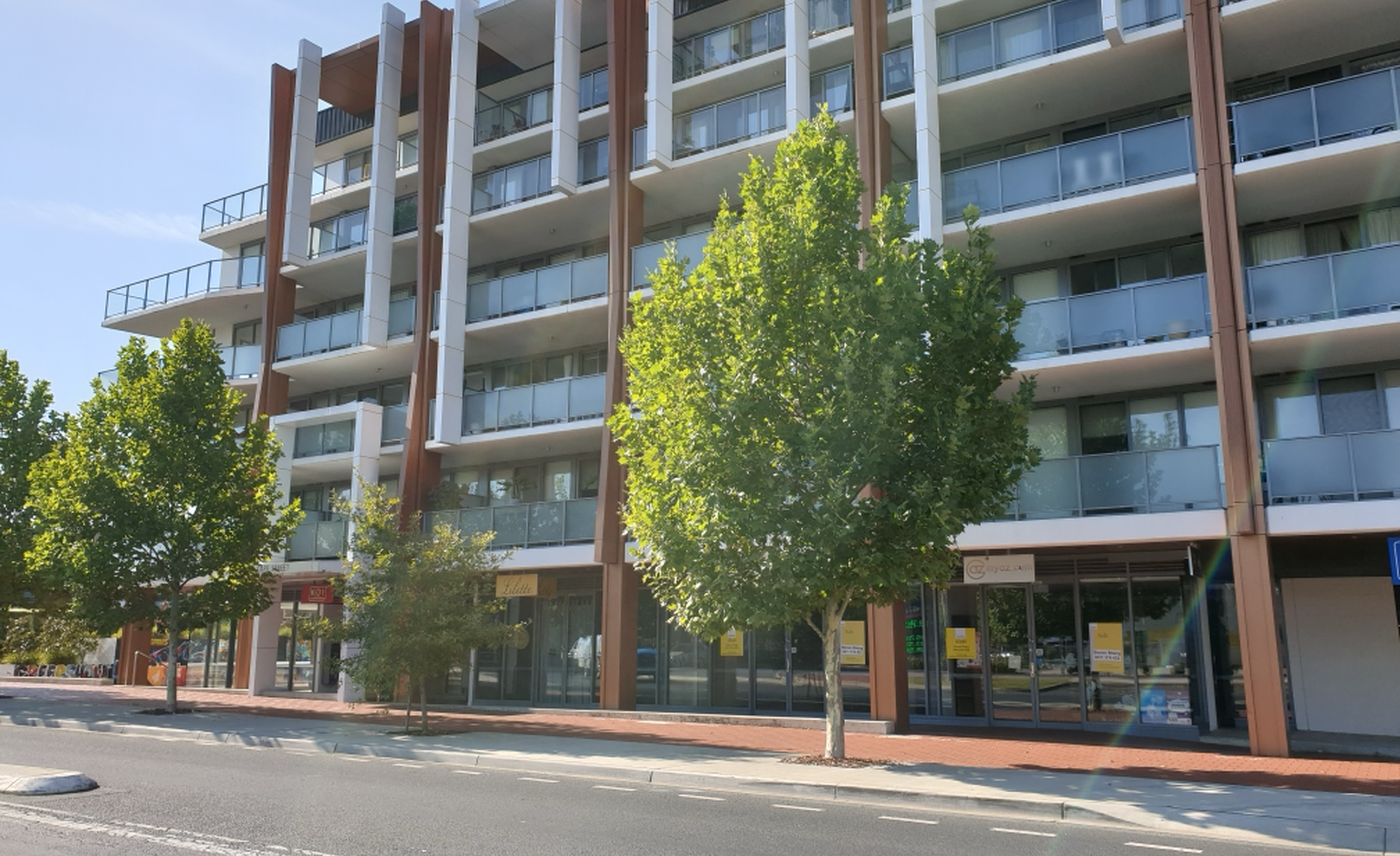 Sanitised Dickson ACT apartment/strata property image for tax depreciation case study showing $216,298 in deductions identified.